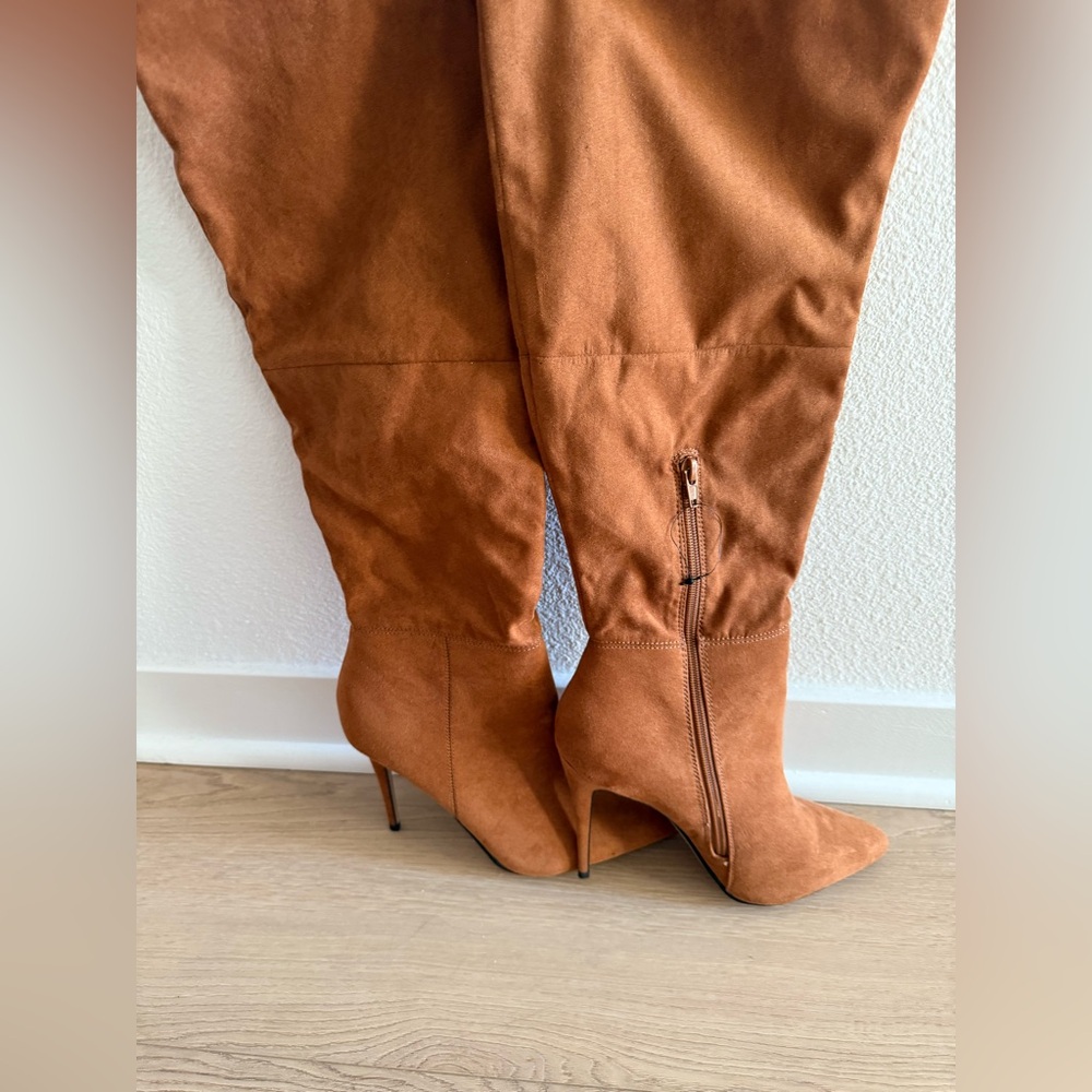 Express High Heeled Tan Boots
Unworn and in good condition-